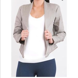 Woman’s gray Convertible jacket